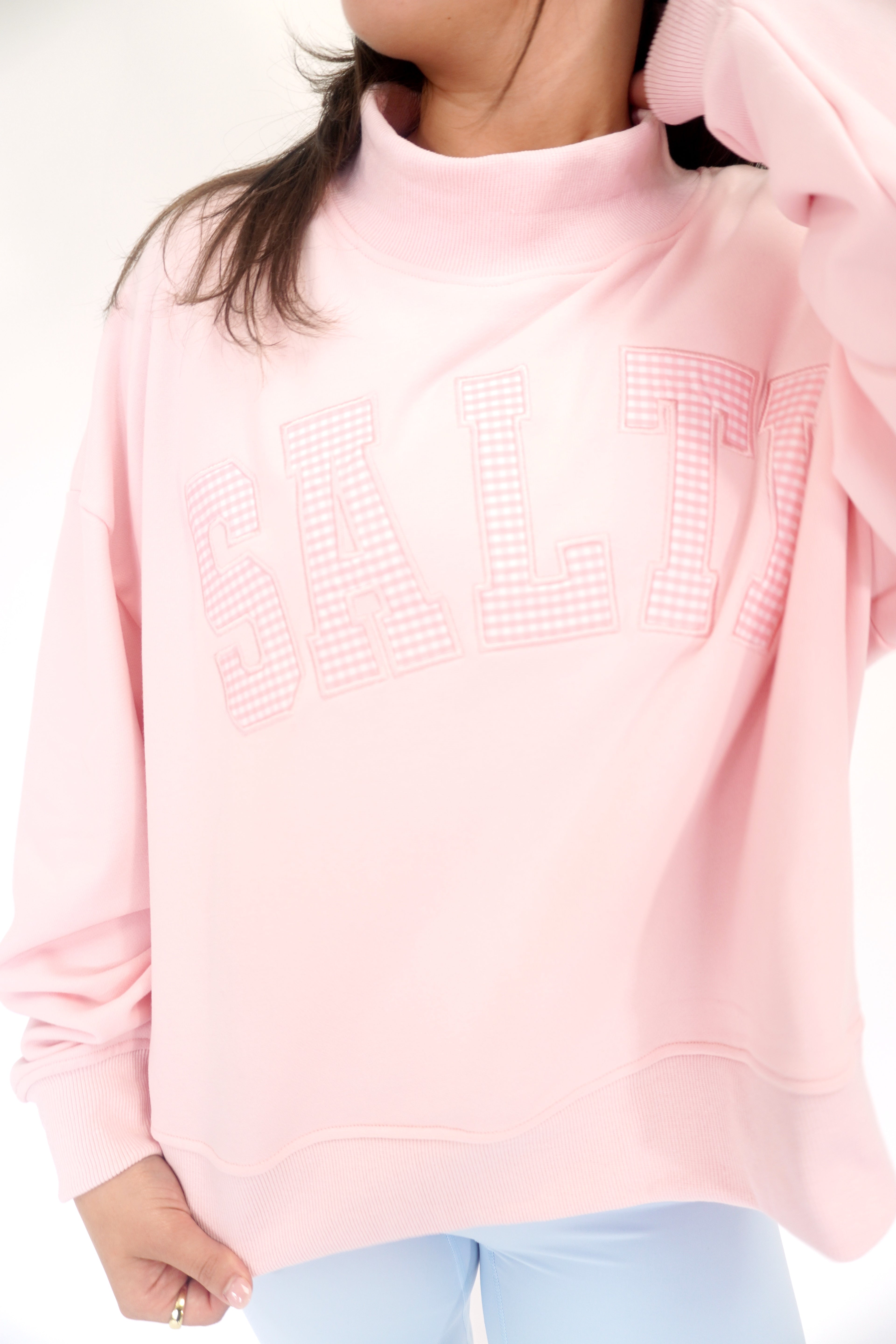 Blush pink mock neck sweatshirt with gingham SALTY lettering and cozy casual style