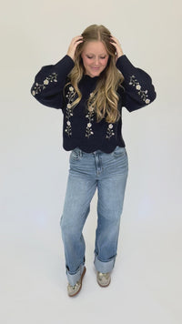 embroidered daisy sweater offering cozy chic fall style