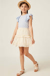 girl-wearing-blue-ruffle-top.jpg