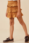 Front view of tween mustard tiered ruffle skirt with smocked waistband – Anderson Ave Boutique