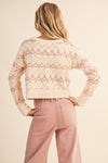 Flat lay of tween cream striped open-knit sweater – lightweight knitwear