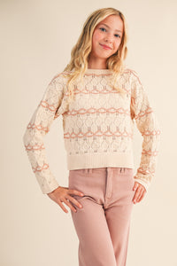 Front view of tween cream open-knit striped sweater with blush accents – Anderson Ave Boutique