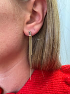 lena-gold-linear-chain-earrings-model-1.jpg