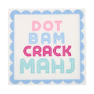 Colorful Dot Bam Crack Mahj cocktail napkins featuring pink and blue mahjong-inspired lettering and scalloped blue border.