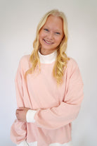 Soft blush pink striped mock neck sweatshirt for women, cozy and casual fit