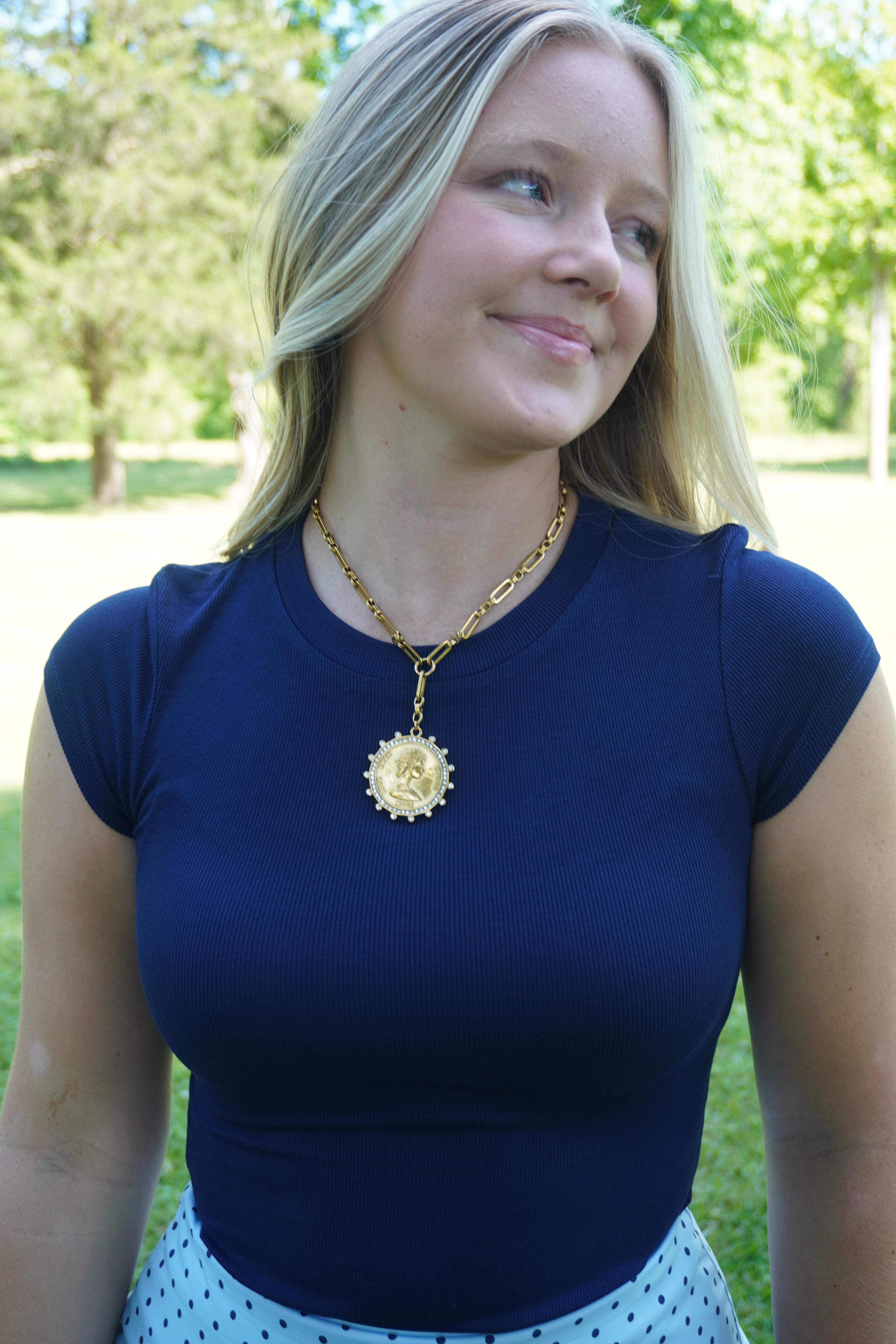 Fitted navy ribbed top styled with a light blue polka dot maxi skirt