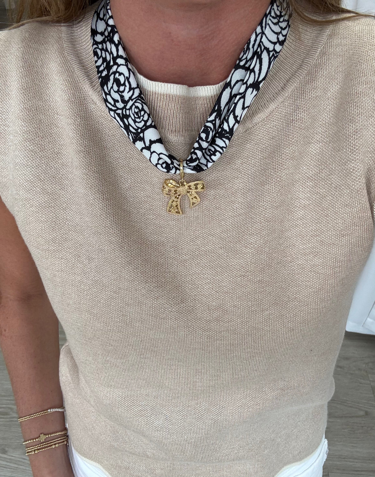 black-white-patterned-scarf-with-bow-charm.jpg