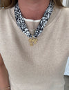 black-white-scarf-necklace-gold-bow-pendant.jpg