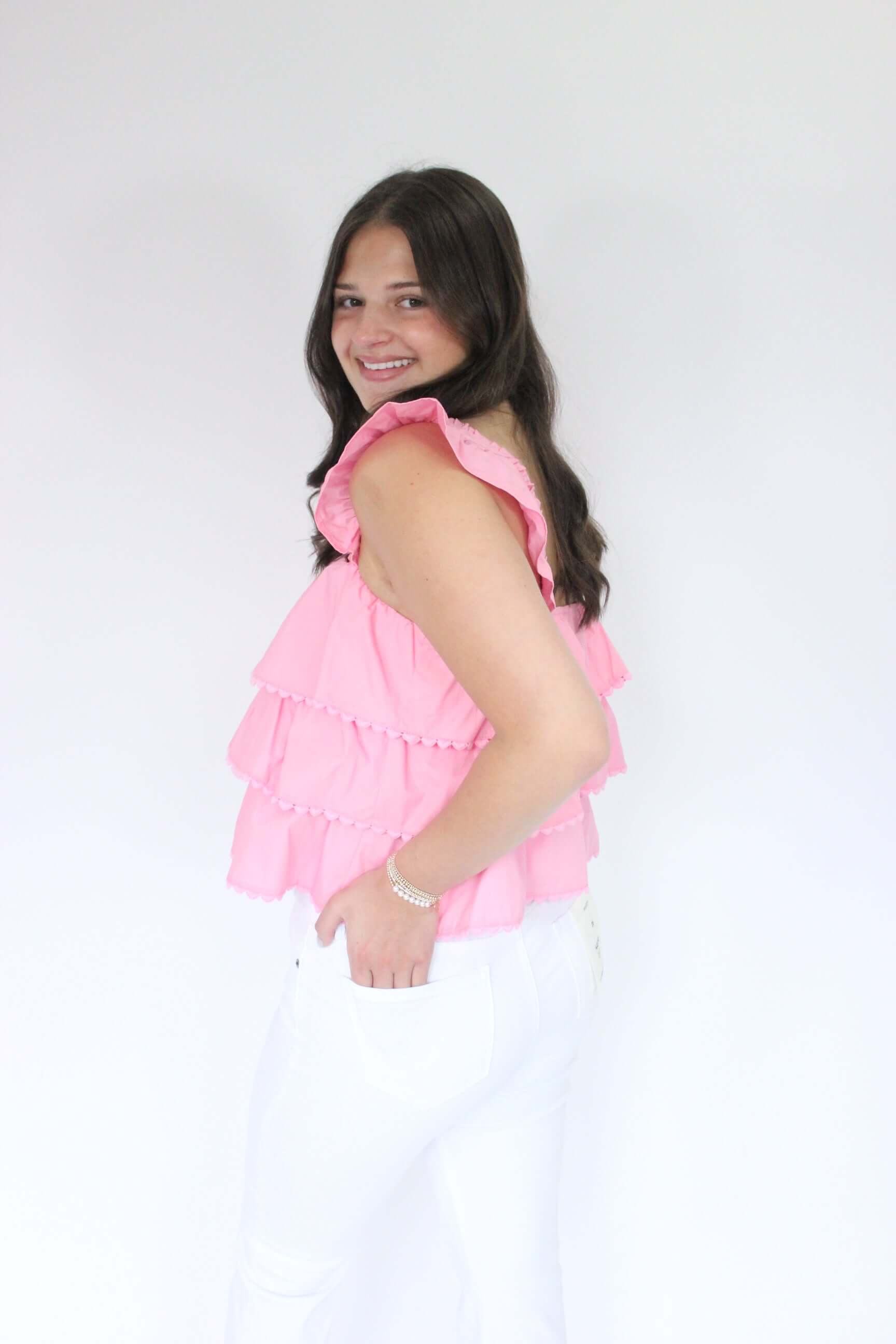 Southern Sweetheart Tiered Ruffle Top - Pink hand in back pocket 