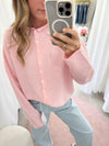 Charlotte pink knit cardigan styled with jeans – soft button-front sweater for women