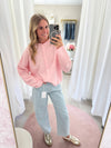Model wearing Charlotte Cozy Pink Knit Button Front Cardigan Sweater – soft baby pink knit style