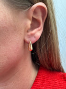 mila-gold-teardrop-stud-earrings-model-1.jpg
