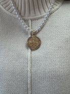 pearl-strand-gold-medallion-necklace-1.jpg