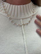 ella-gold-wrapped-pearl-necklace-model-1.jpg