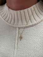 gold-beaded-cross-necklace-1.jpg