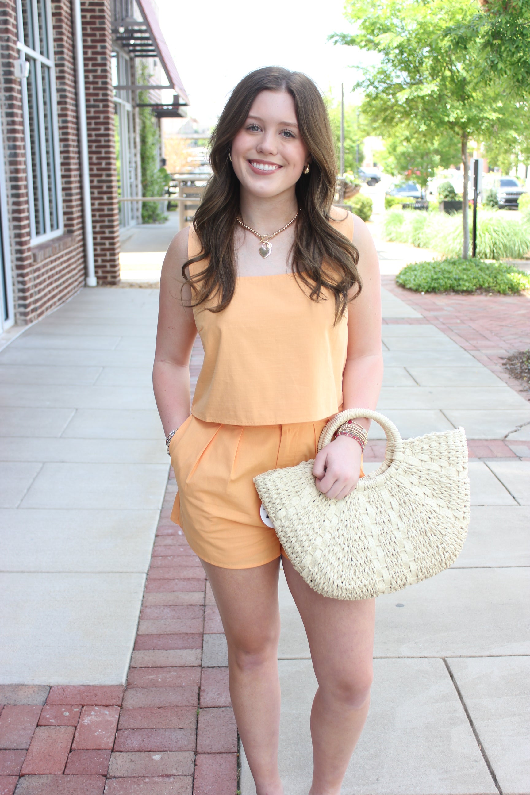 casual-peach-romper-woven-bag-style.jpg