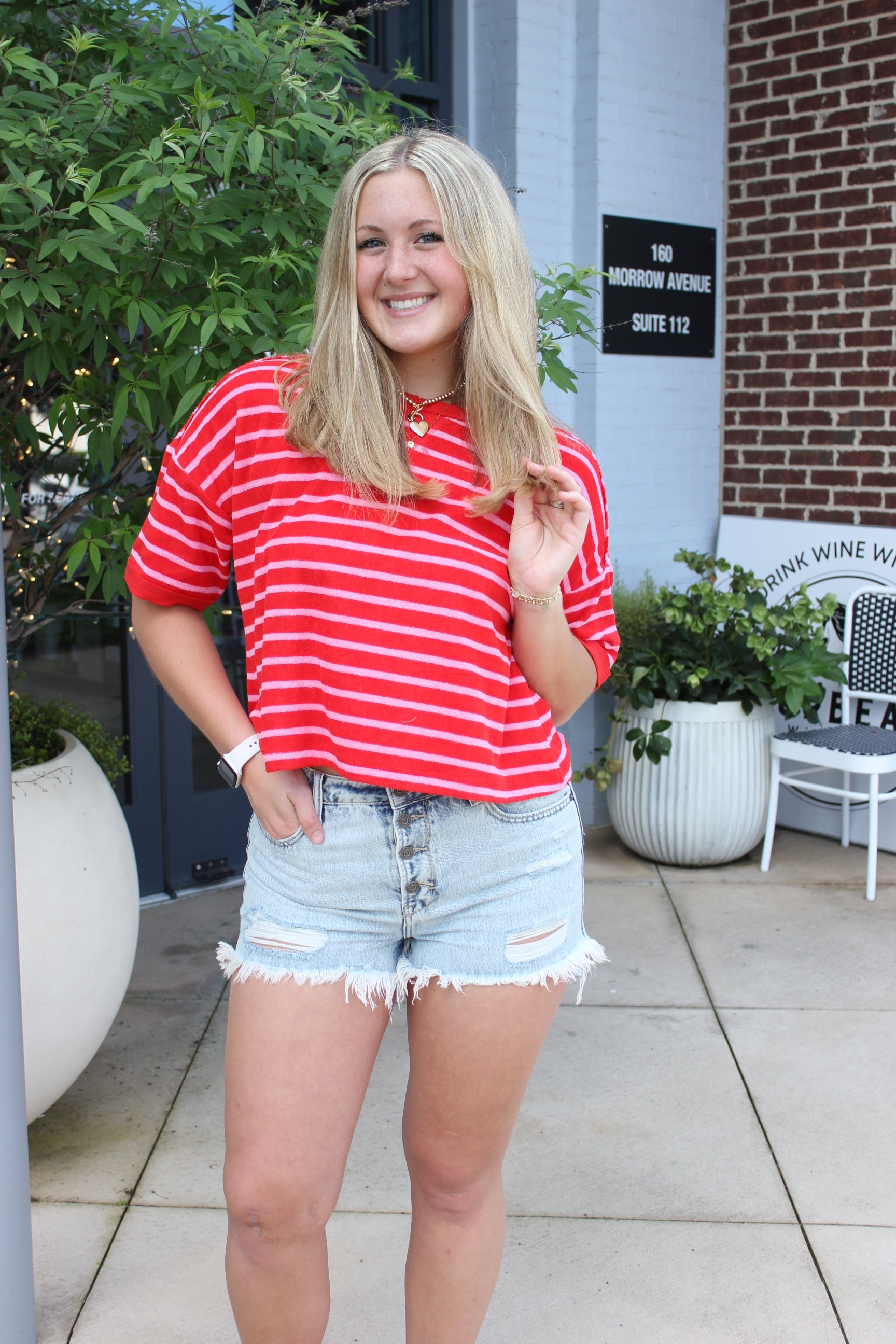 casual-summer-outfit-striped-top-and-ripped-shorts.jpg