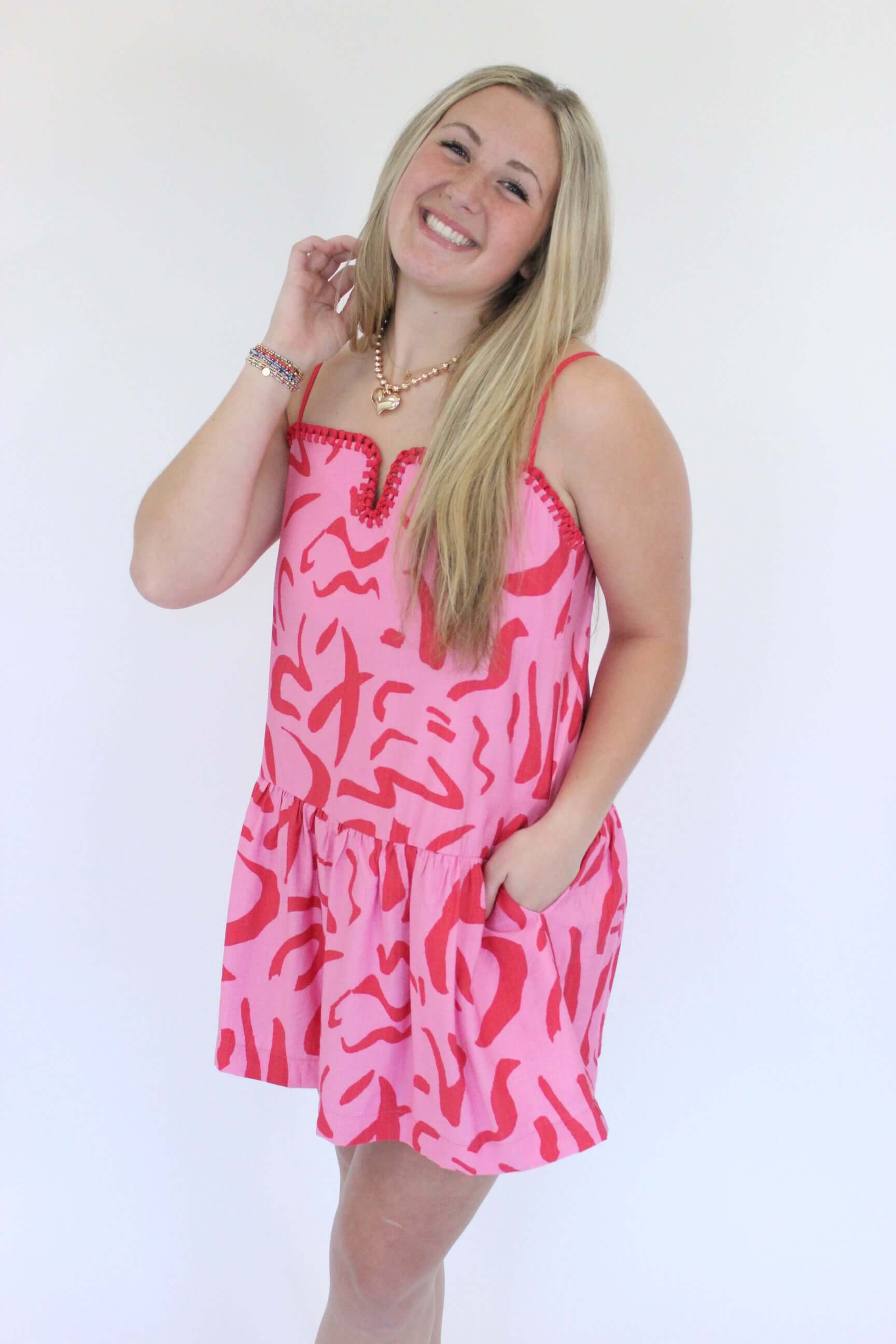 Sunkissed Sass Mini Dress hand in hair