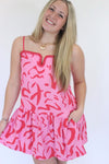 Sunkissed Sass Mini Dress hand in pocket and on dress