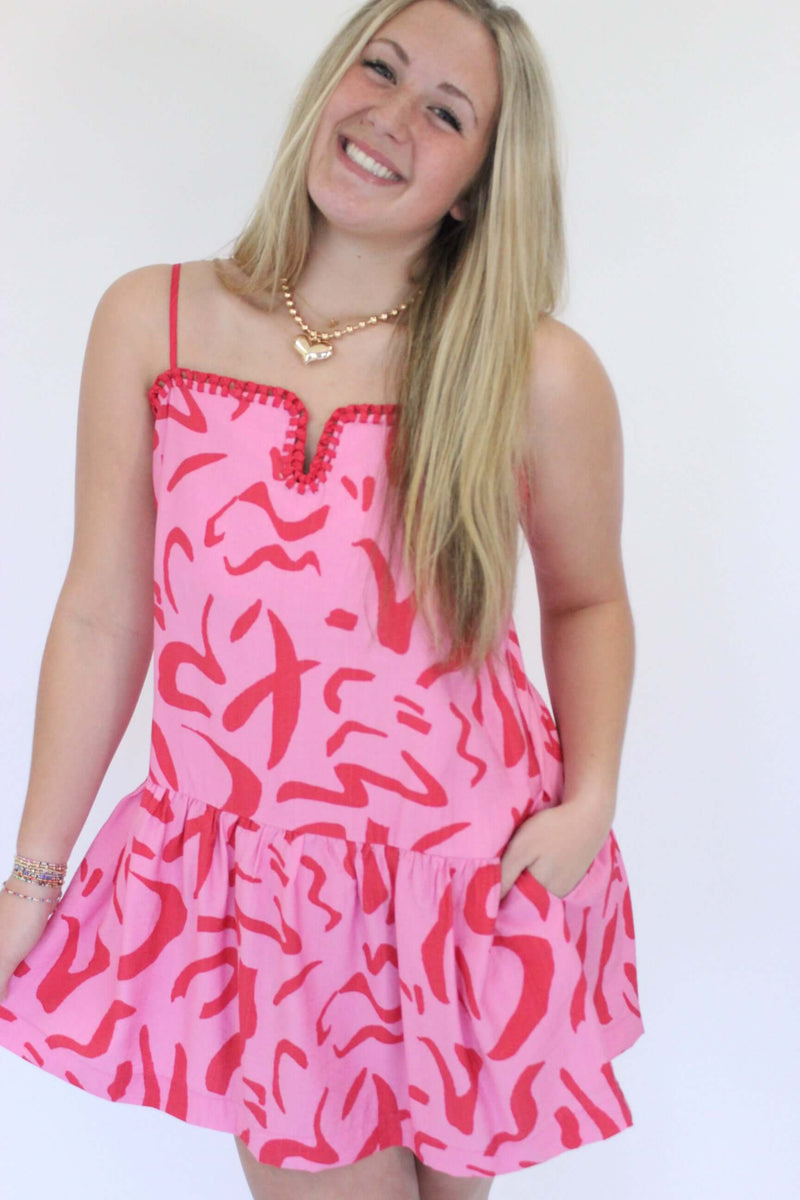 Sunkissed Sass Mini Dress hand in pocket and on dress