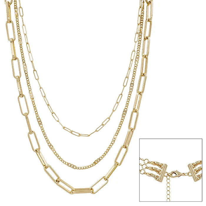Gold chain necklace with a close-up inset on a white background