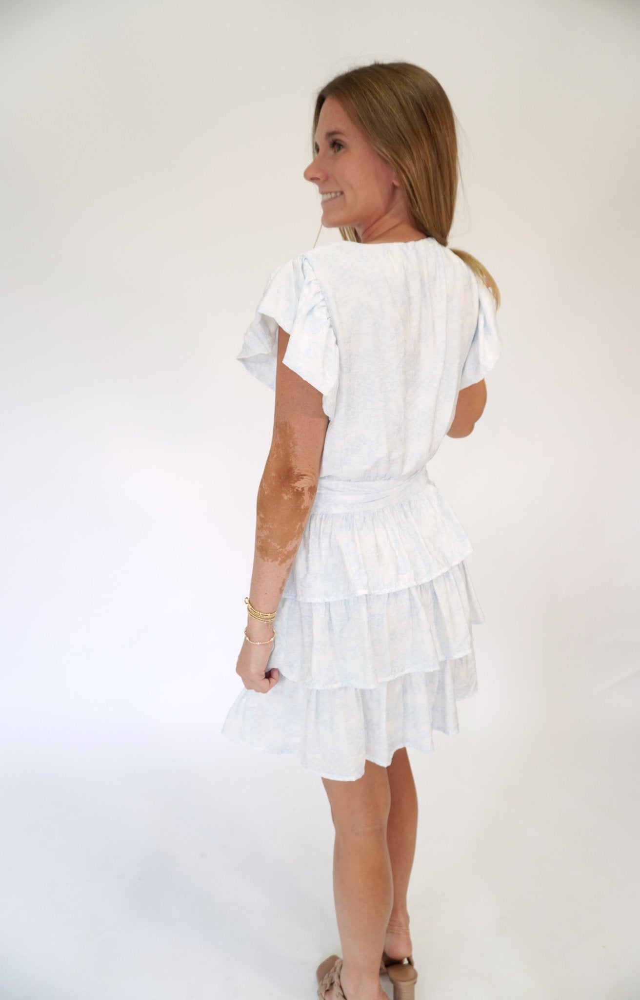 Azure Bloom Tiered Ruffle Mini Dress with Flutter Sleeves - Anderson Ave boutique
