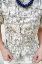 Cream Plaid Floral Embroidered Peplum Top - Anderson Ave boutique