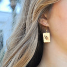 Gold Flower Power Mahjong Earrings featuring a classic flower tile design with lightweight fishhook backs.