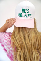 “He’s Golfing” Embroidered Pink & White Baseball Cap - Anderson Ave boutique