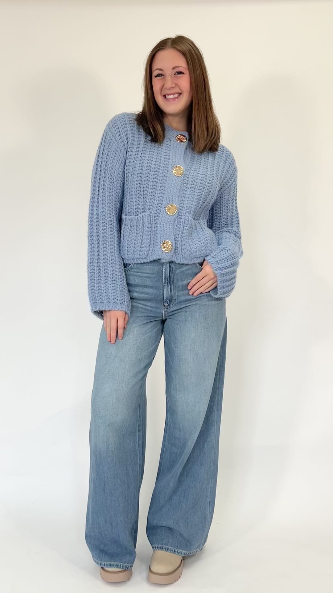 Casual blue knit button-up cardigan for women with soft chunky fabric