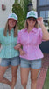 Women’s summer blouse with vertical pink stripes, collar detail, and relaxed fit