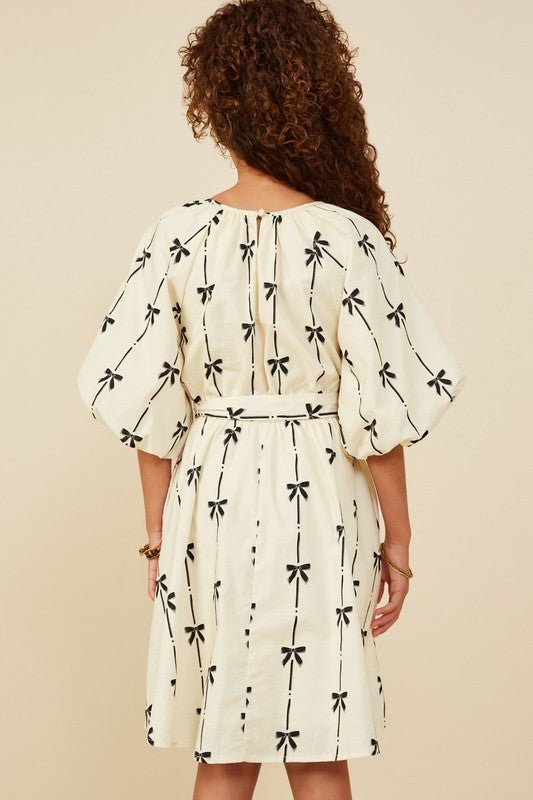 Tween Ivory Puff Sleeve Dress with Black Bow Print - Anderson Ave boutique